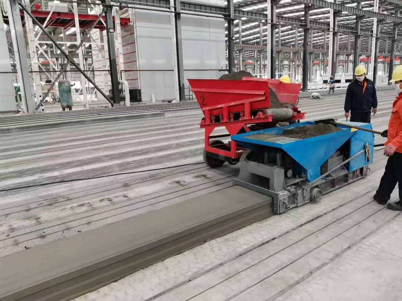 Precast forming equipment on casting beds in a factory